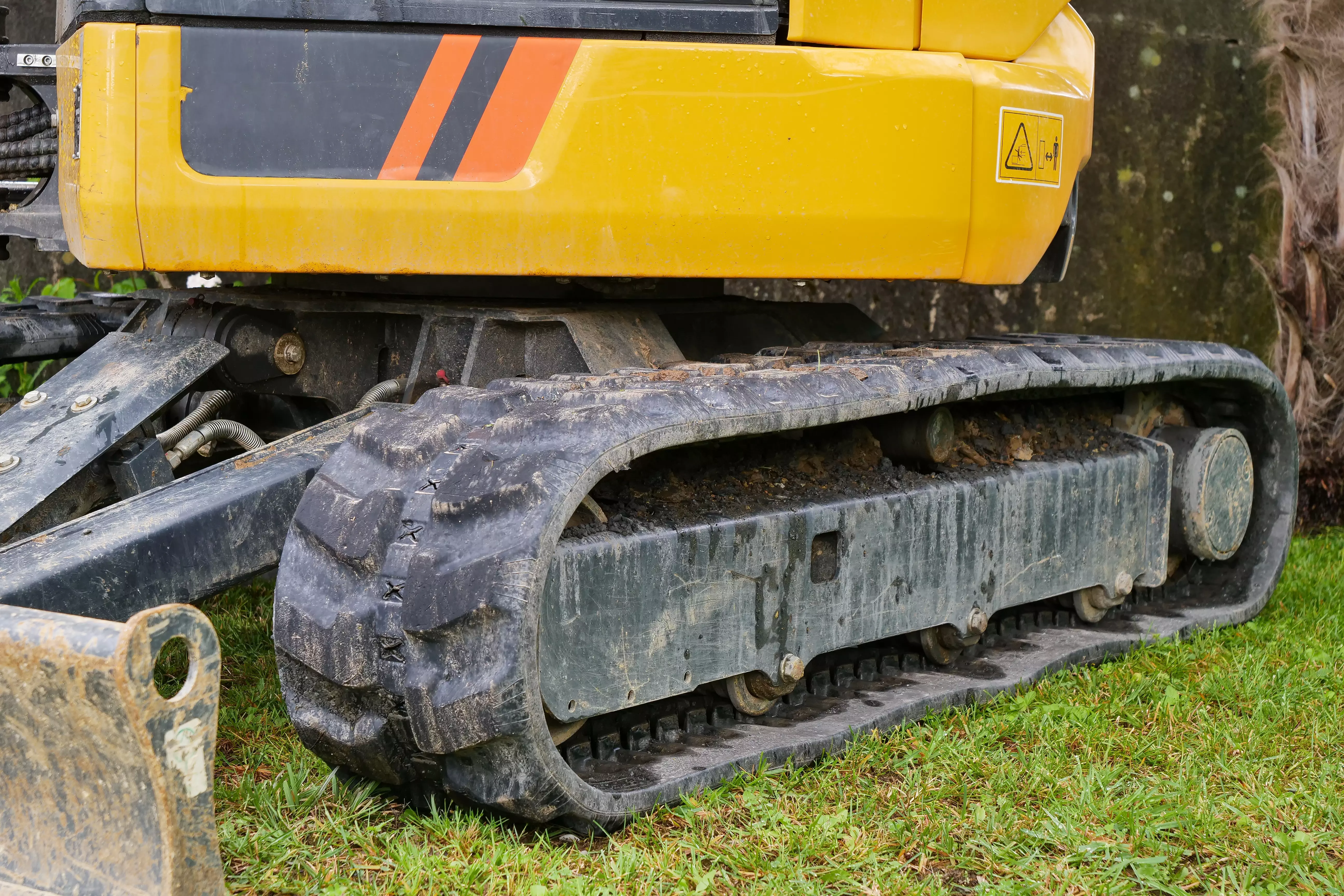 Entretien des chenilles en caoutchouc Trabber